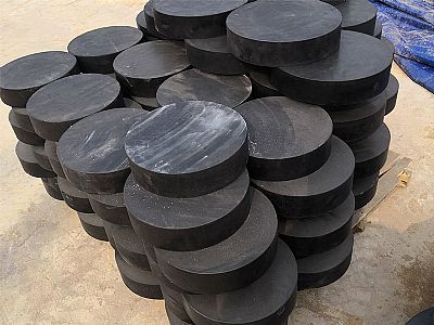 新洲区板式橡胶支座由若干层橡胶片与薄钢板经加压硫化